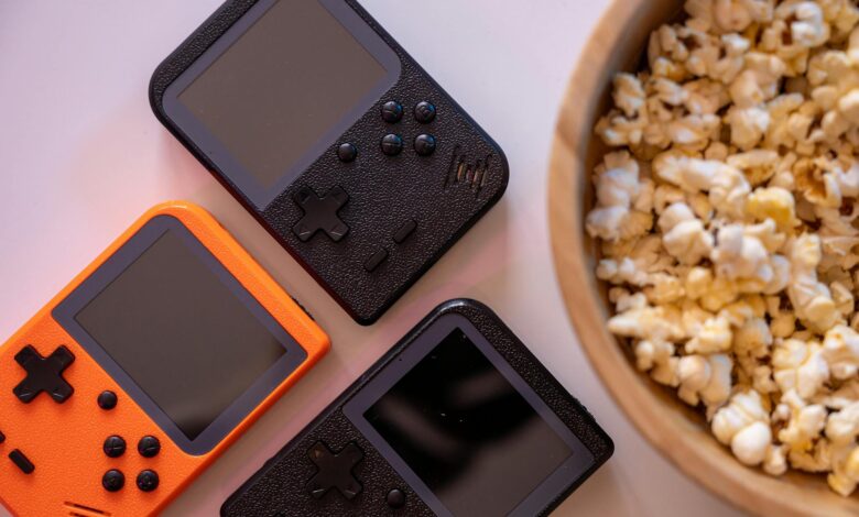 Modern gaming console with controller on entertainment center