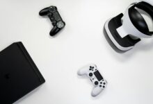 Modern gaming console setup showing sleek black console design