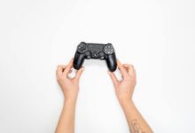 Gaming controller and console representing the video game industry merger landscape
