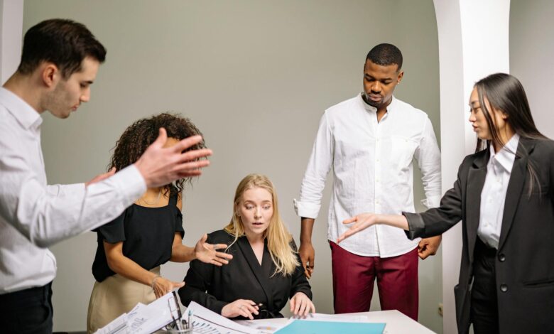 Group of office workers in meeting discussing workplace issues and collective action