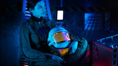 Futuristic spacecraft cockpit interior with control panels and displays