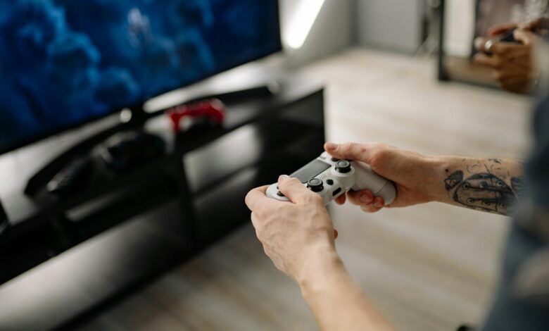 Modern gaming console setup with multiple storage devices and cables