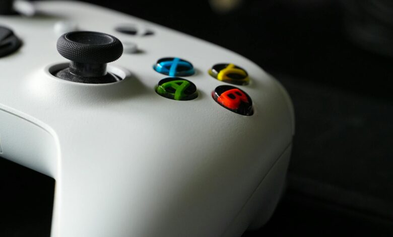 Close-up of modern gaming controller showing buttons and design details