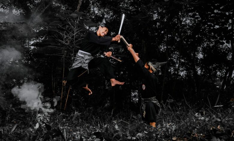 Gaming controller with fighting game on screen showing combat interface