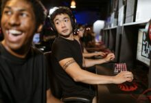 Professional esports arena with gaming stations and screens