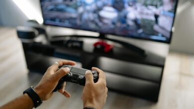 Modern gaming console on entertainment center showcasing compact design