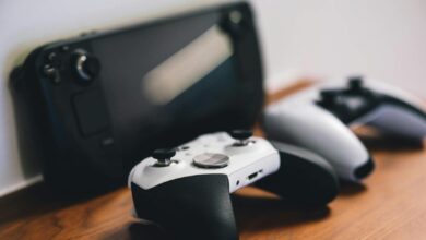 Modern gaming controller on dark surface representing PlayStation gaming hardware