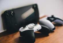 Modern gaming console controller on dark surface highlighting current generation hardware