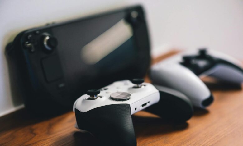 Modern gaming console controller on dark surface highlighting current generation hardware