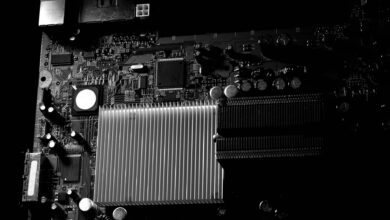 Close-up view of computer graphics card installed on motherboard showing GPU cooling system