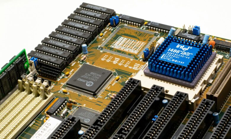 Close-up view of a gaming PC motherboard showing M.2 SSD slots and cooling components