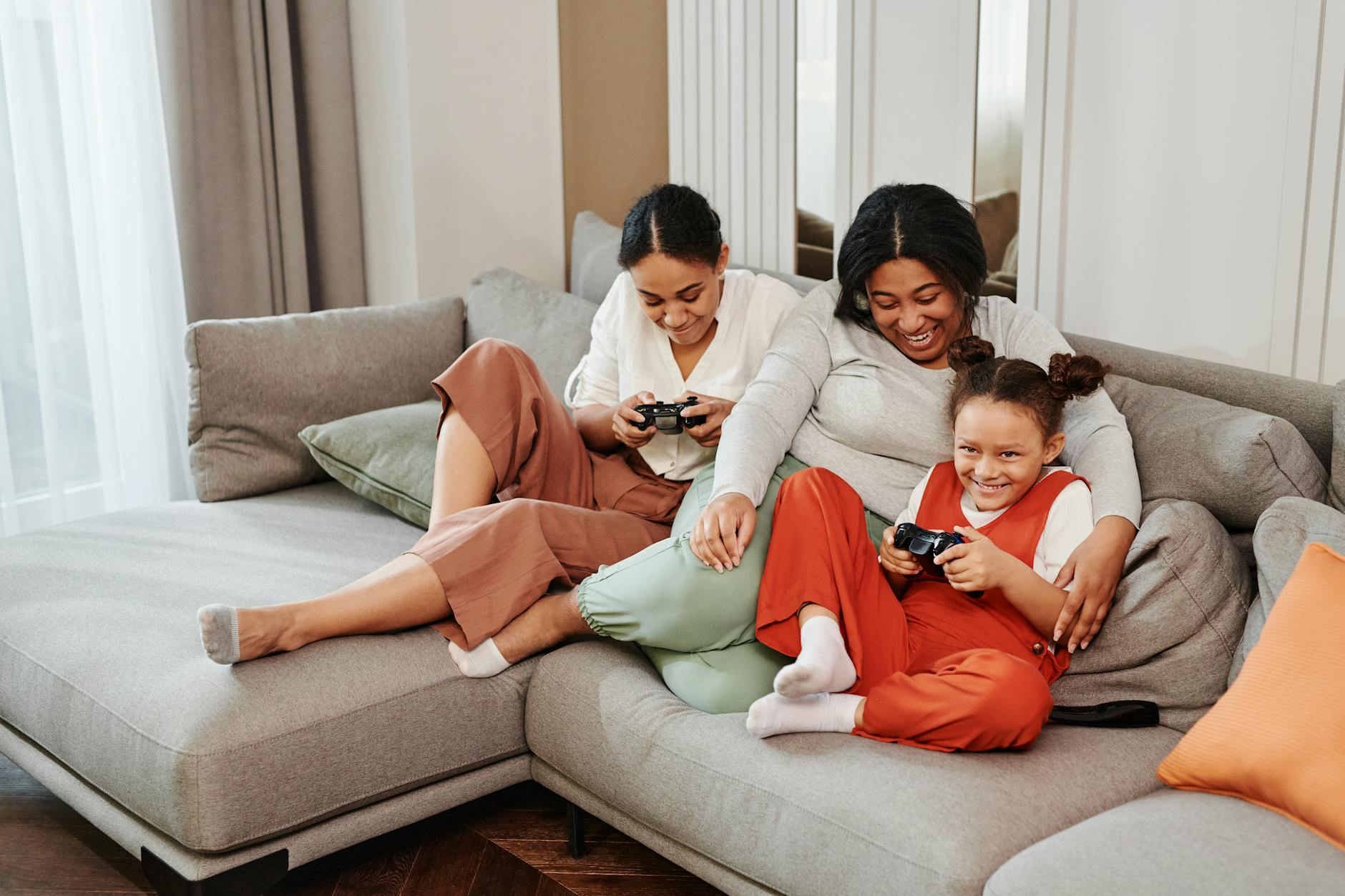 Family playing video games together during holiday season