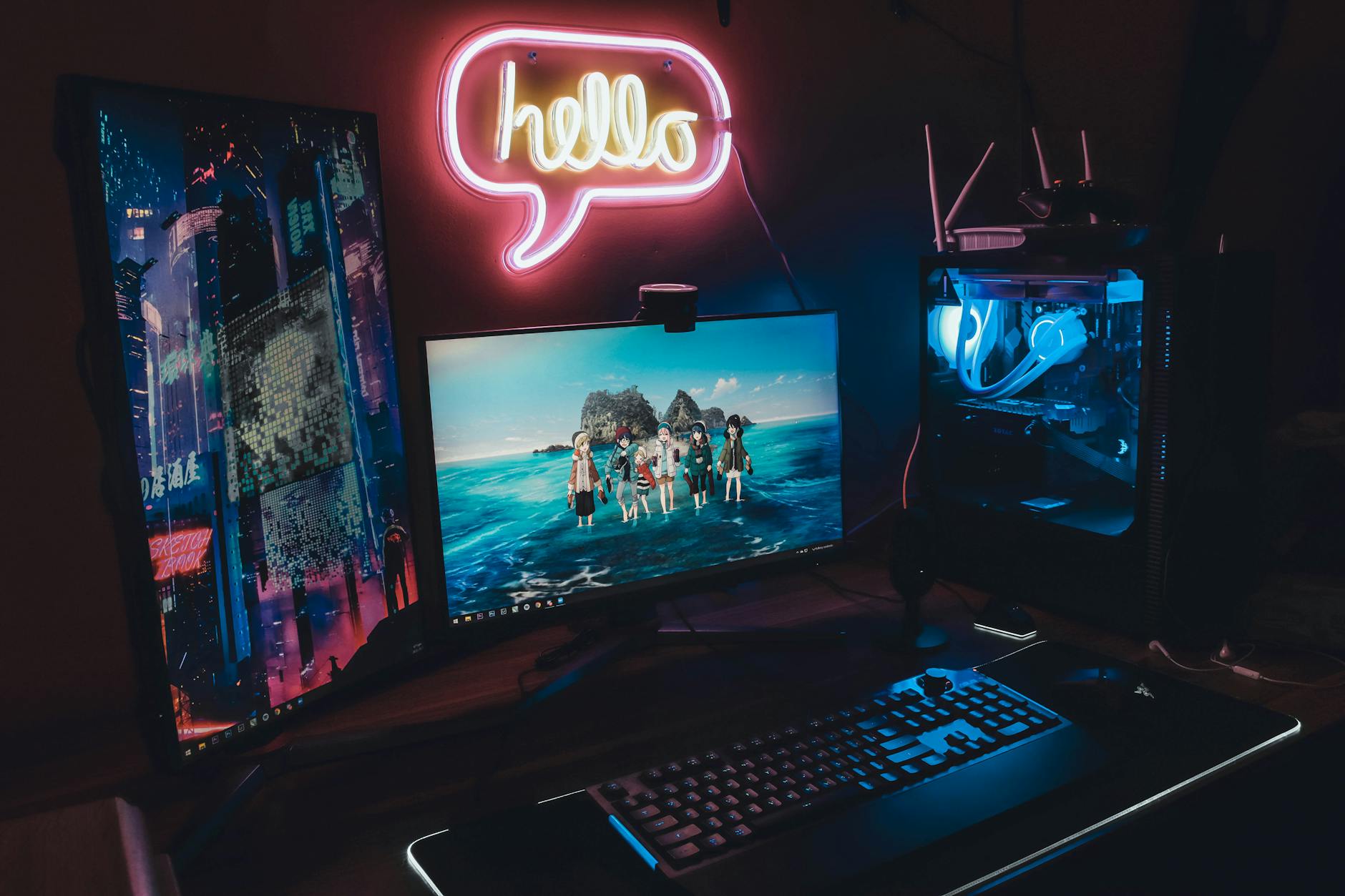 High-resolution gaming monitor displaying colorful game graphics with mechanical keyboard