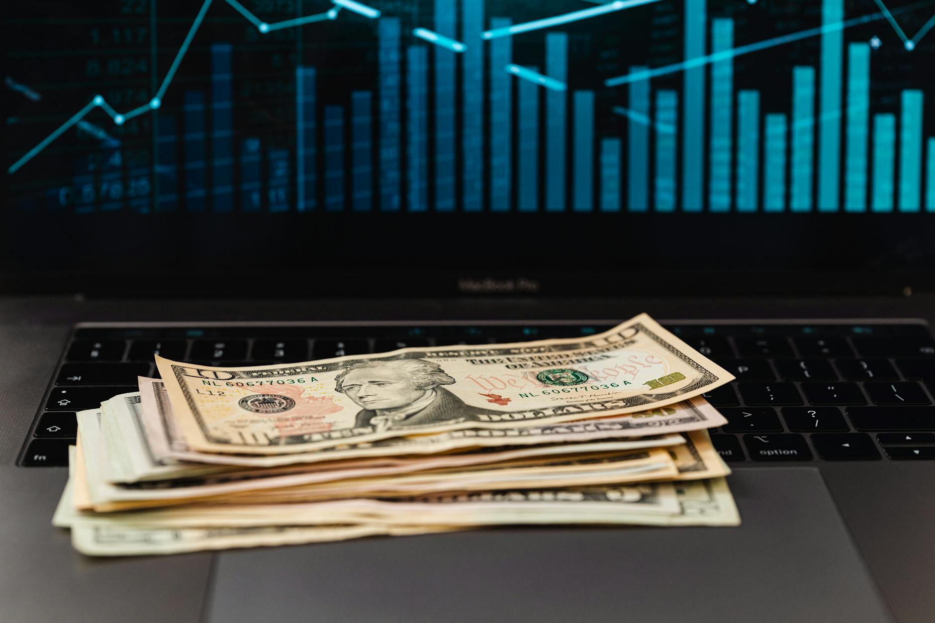 Computer screen displaying financial charts and revenue analytics for digital content creators