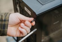 Compact mid-tower PC case with mesh front panel and tempered glass side panel
