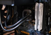 Close-up of a dual-tower CPU air cooler installed on a desktop PC motherboard