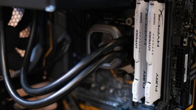 Close-up of a dual-tower CPU air cooler installed on a desktop PC motherboard