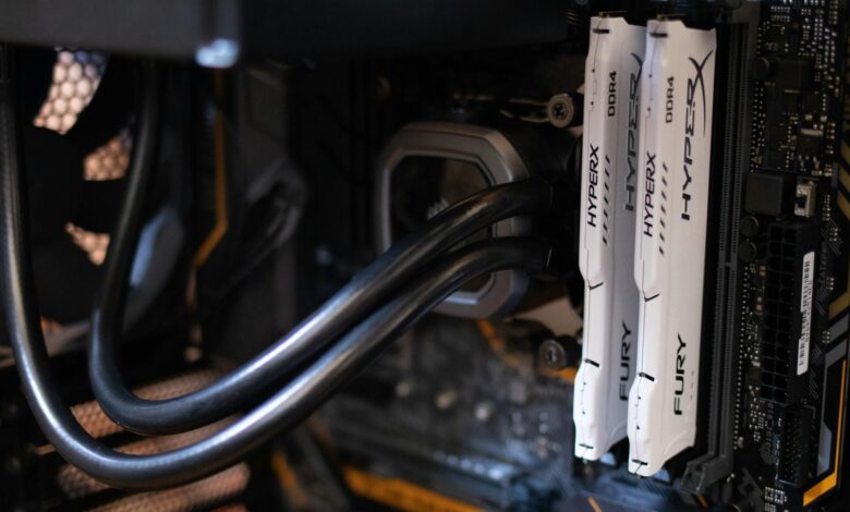 Close-up of a dual-tower CPU air cooler installed on a desktop PC motherboard