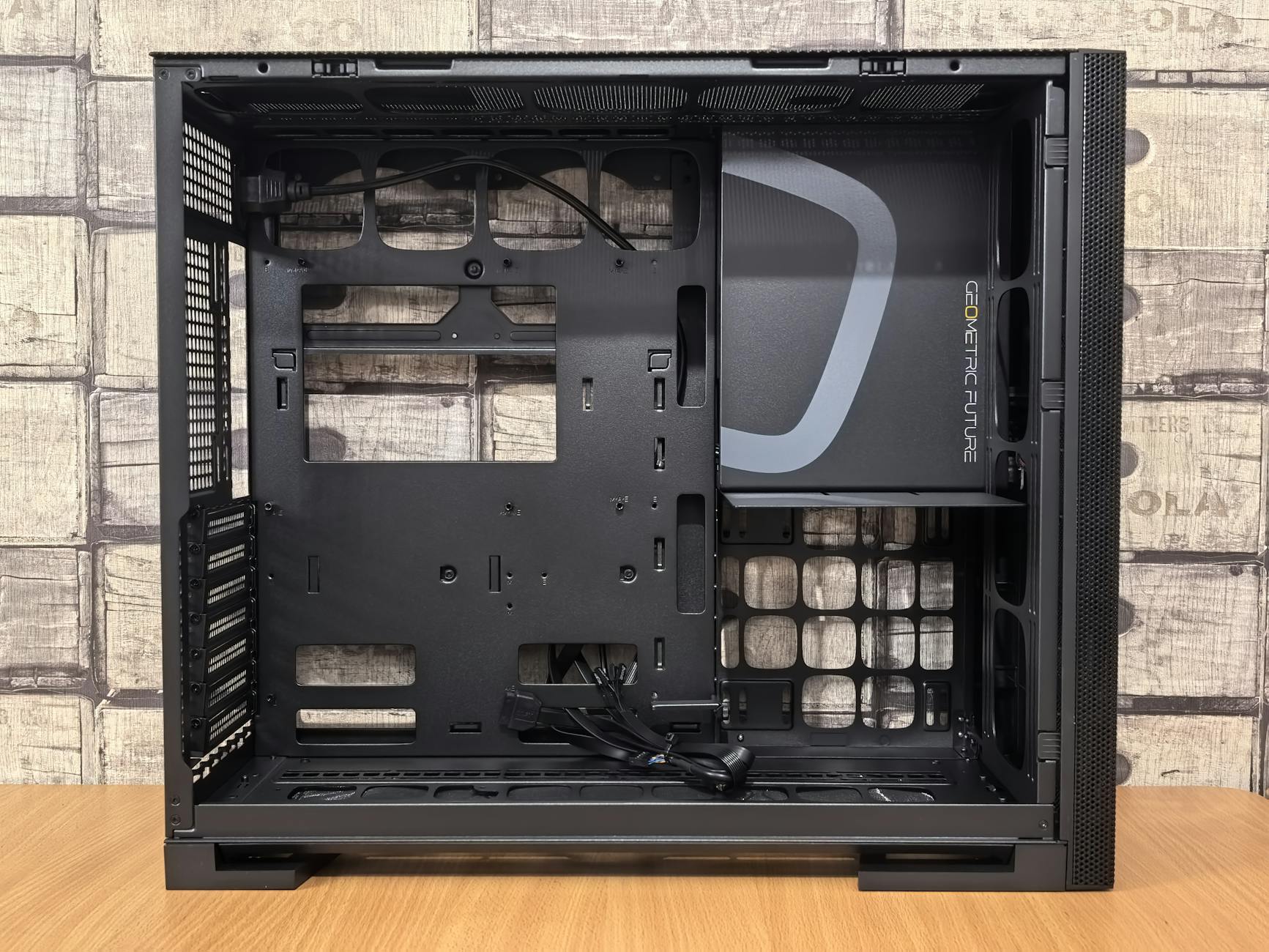 Close-up view of a mini ITX computer case interior showing component layout and airflow design