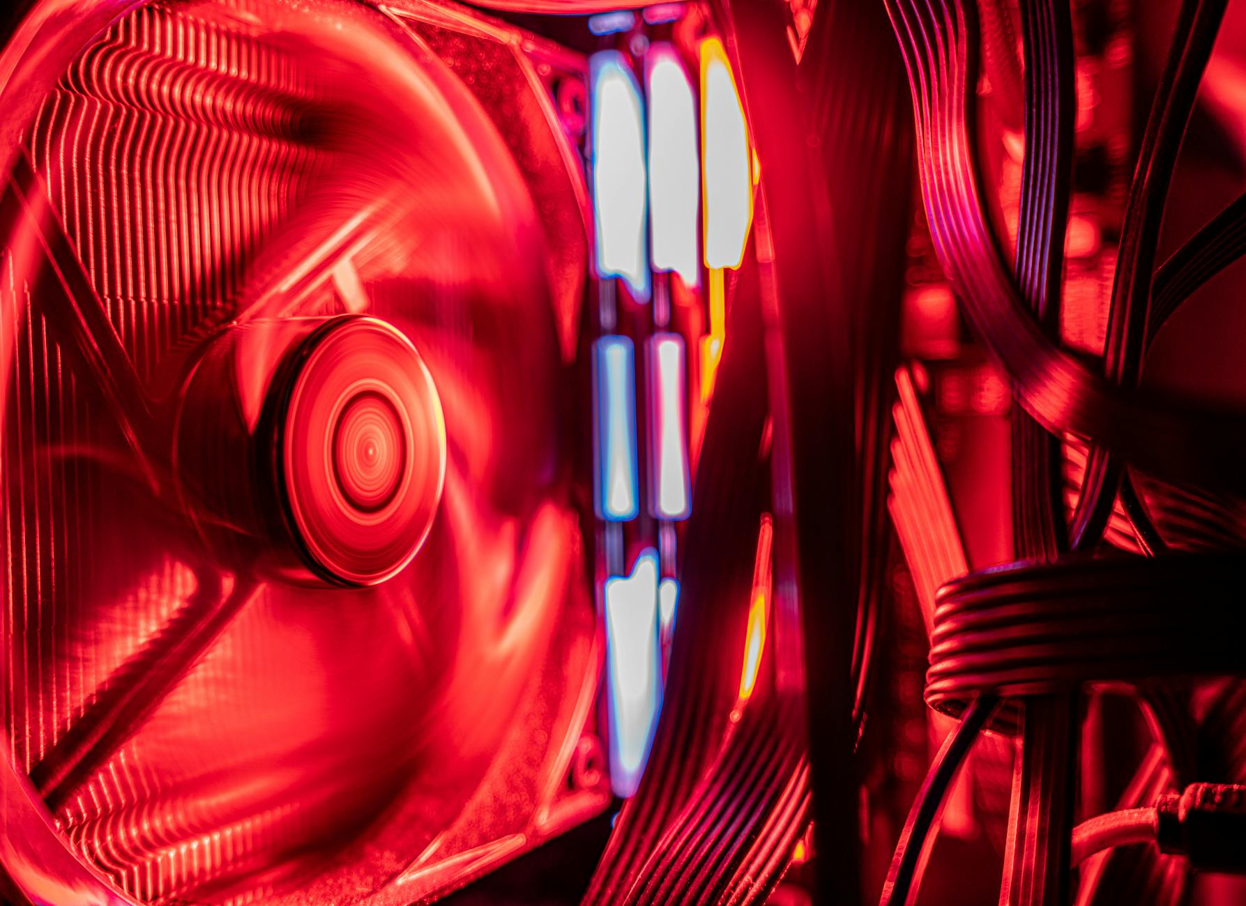 Interior of a gaming PC build showing cooling components and motherboard