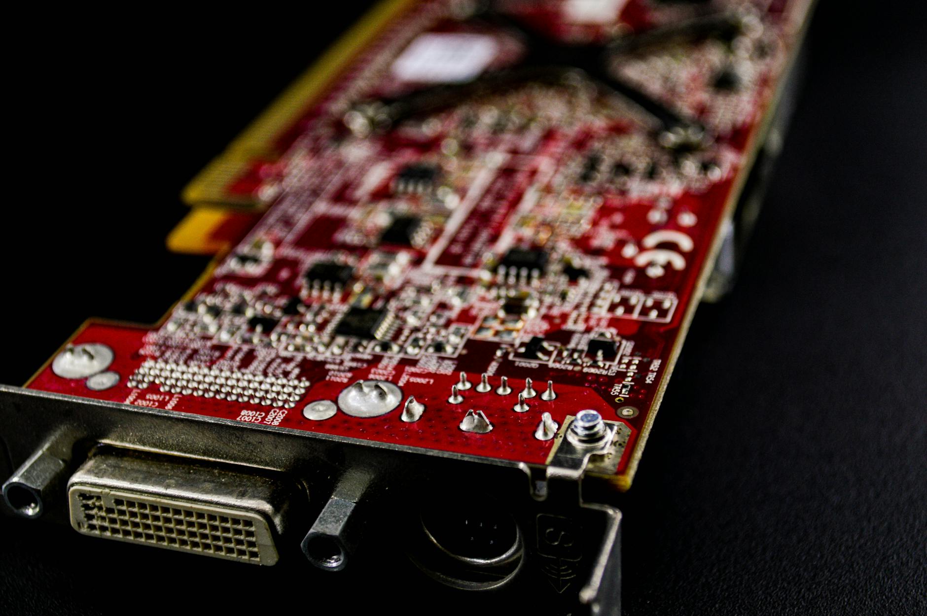 Detailed view of computer motherboard showing CPU socket area where coolers are installed