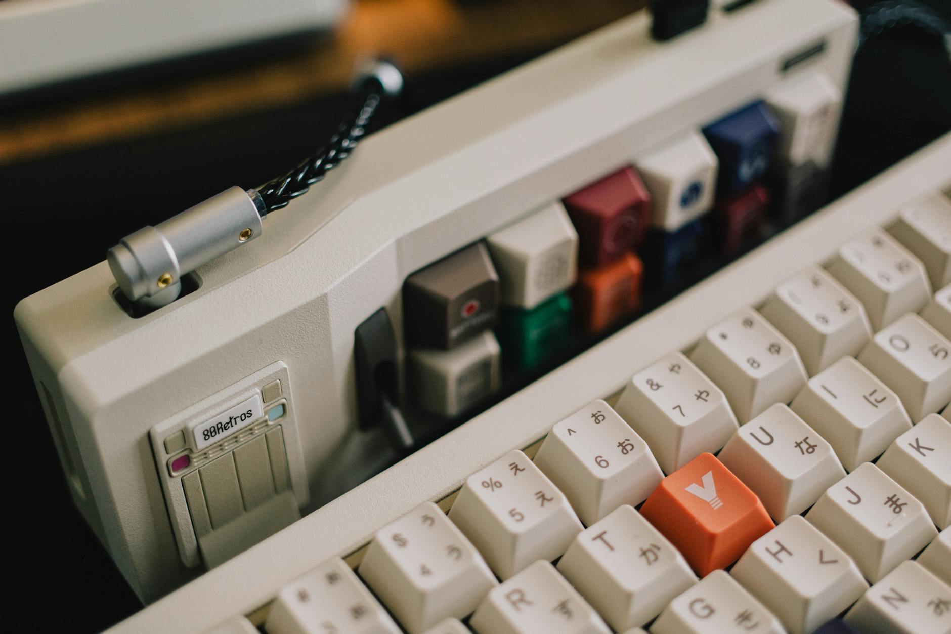 Close-up view of mechanical keyboard switches and keycaps showing build quality details