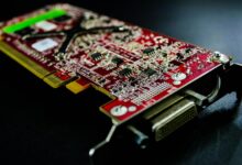 Close-up of a discrete graphics card with visible cooling fans and PCIe connectors