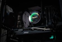 Compact Mini-ITX PC build with small form factor chassis on a desk