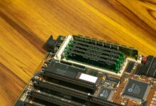 Two DDR5 memory kits installed in a high-end gaming PC motherboard