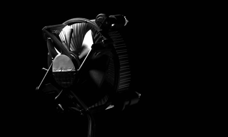 Large dual-tower air cooler mounted on a desktop PC motherboard