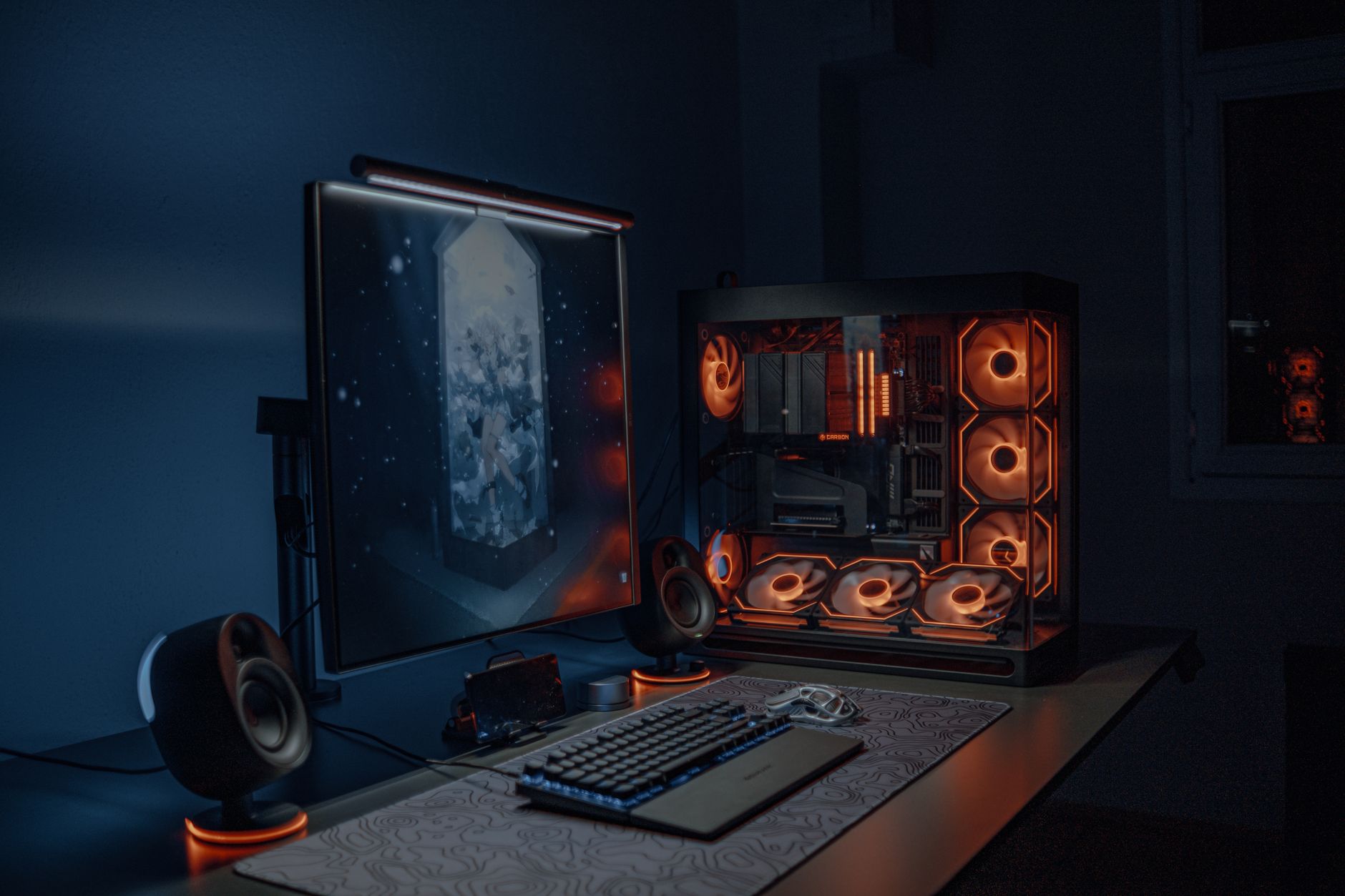 Interior of a gaming desktop PC showing lit components and cooling system