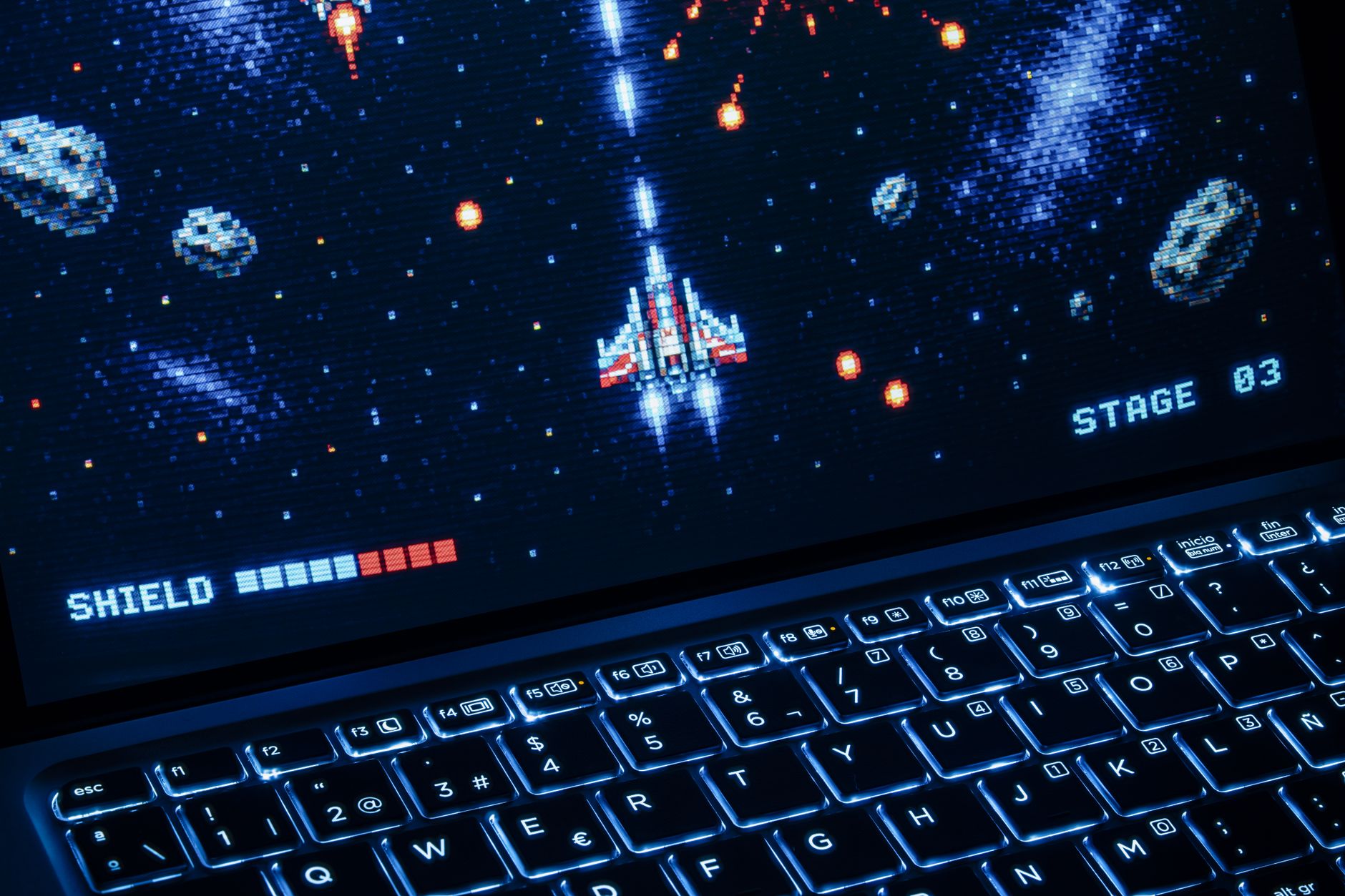 Gaming laptop screen displaying a video game, illustrating integrated graphics performance testing