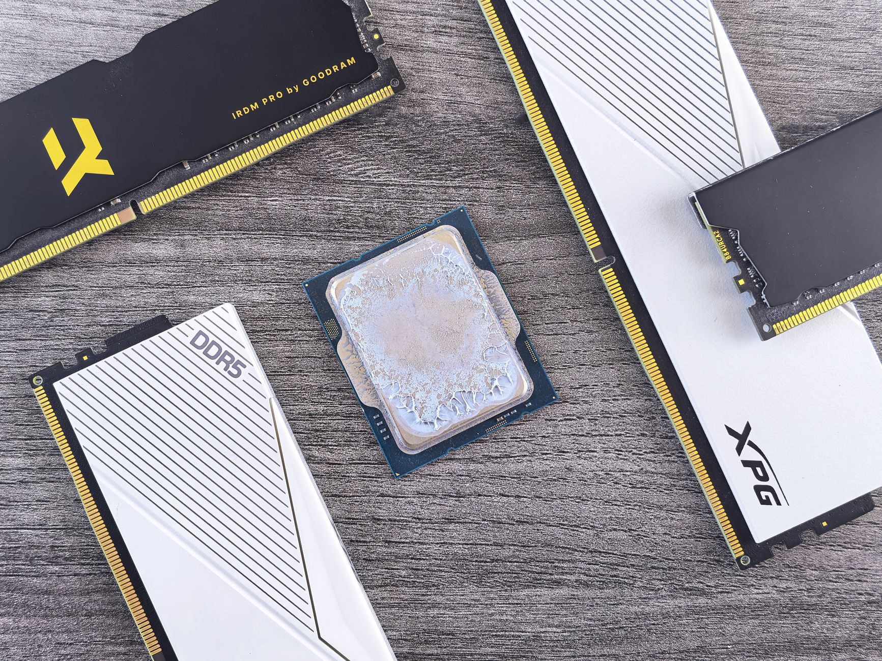 Technician applying thermal paste to a processor during a PC build or maintenance session