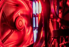 Asus ROG Crosshair X870E Hero motherboard close-up showing VRM heatsinks and AM5 socket