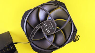 Close-up of a high-performance CPU air cooler with ARGB lighting installed on a desktop PC motherboard