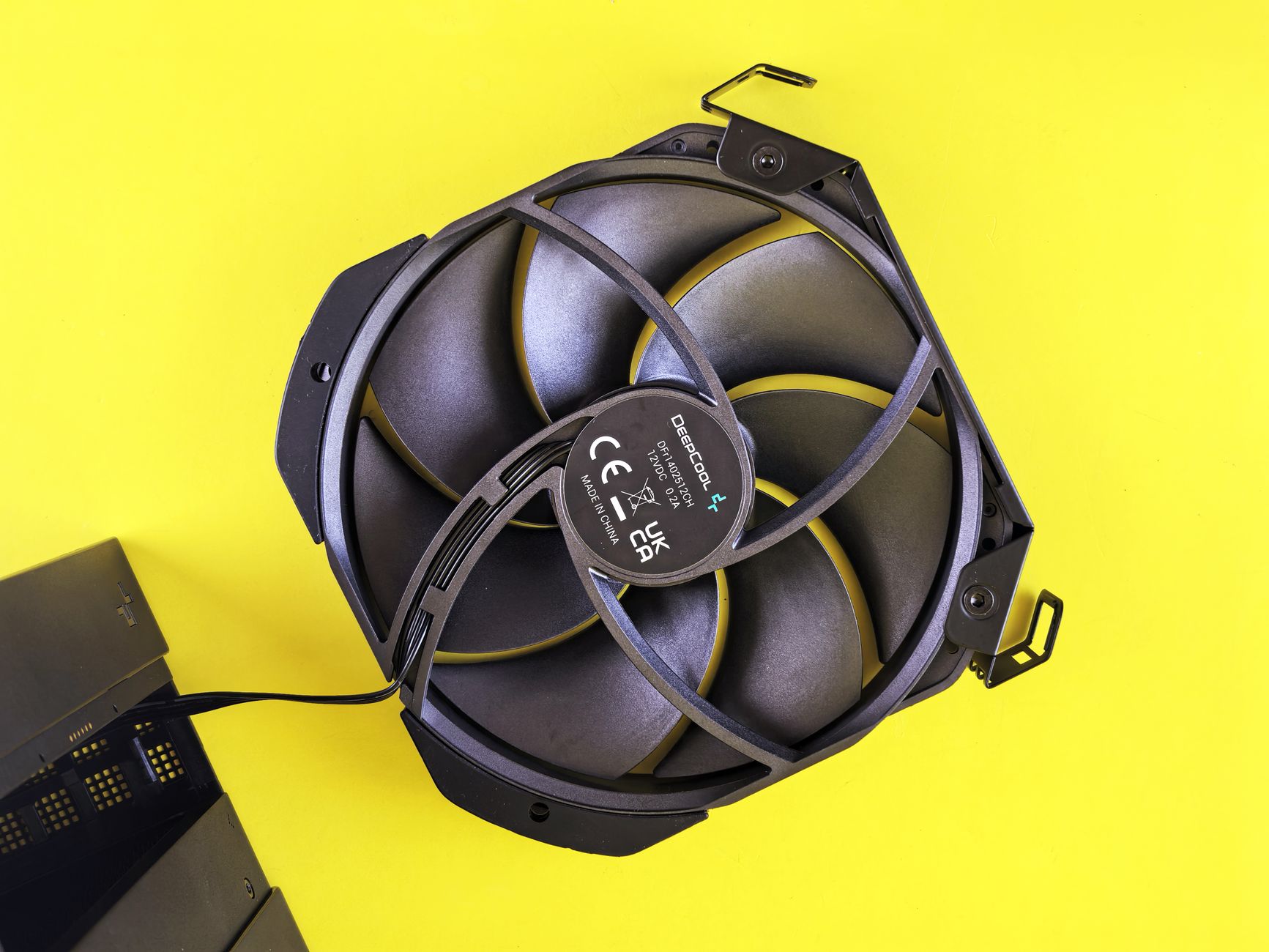 Close-up of a high-performance CPU air cooler with ARGB lighting installed on a desktop PC motherboard