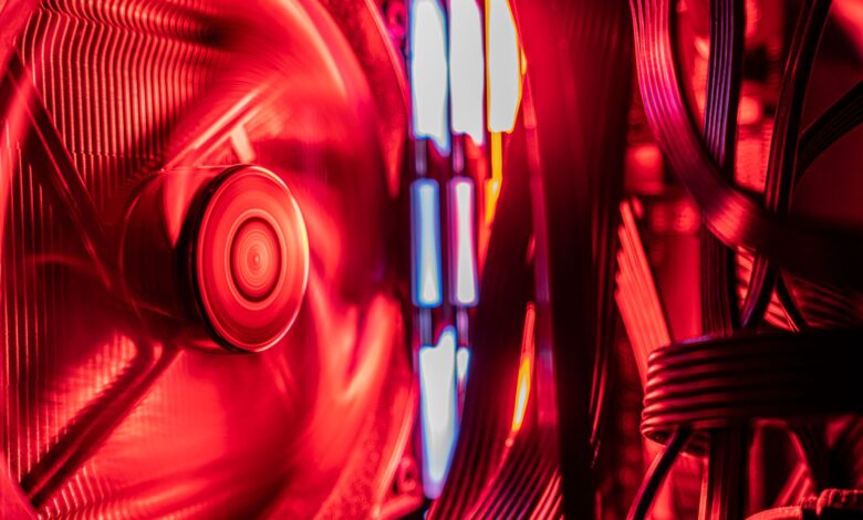 Large air CPU cooler mounted inside a desktop PC case with visible heat pipes and fan