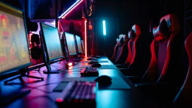 High-end gaming PC setup with monitor displaying a game at 1440p resolution