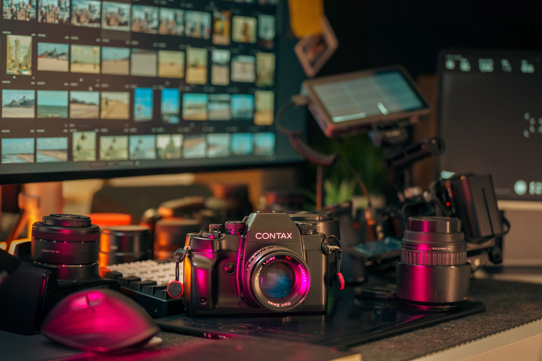 Professional video editing on a widescreen monitor with timeline visible