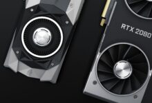 Close-up of a high-end graphics card with triple fan cooler installed in a PC case