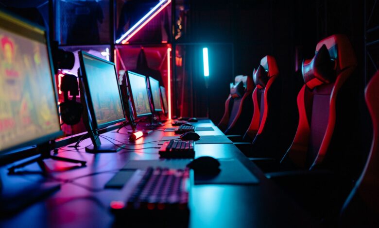 High-end gaming PC desktop setup with RGB lighting and monitor displaying graphics
