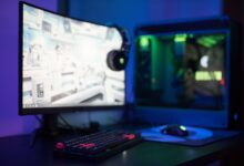 A high-performance gaming PC setup with RGB lighting on a desk