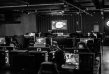 A high-performance gaming PC setup with RGB lighting ready for GPU benchmarking