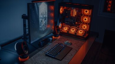 Gaming PC setup with glowing components on a desk