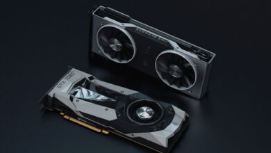 Close-up of a modern graphics card showing cooling fans and heatsink design