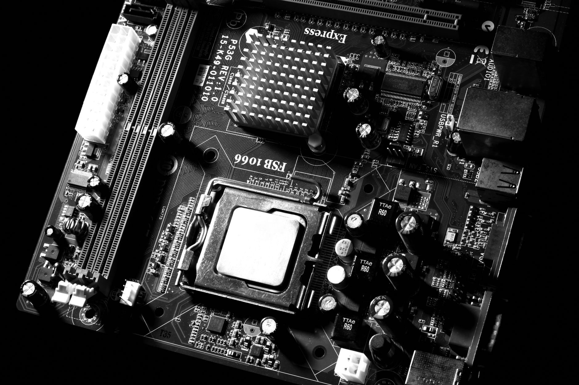 PC components including a graphics card laid out on a desk during a build