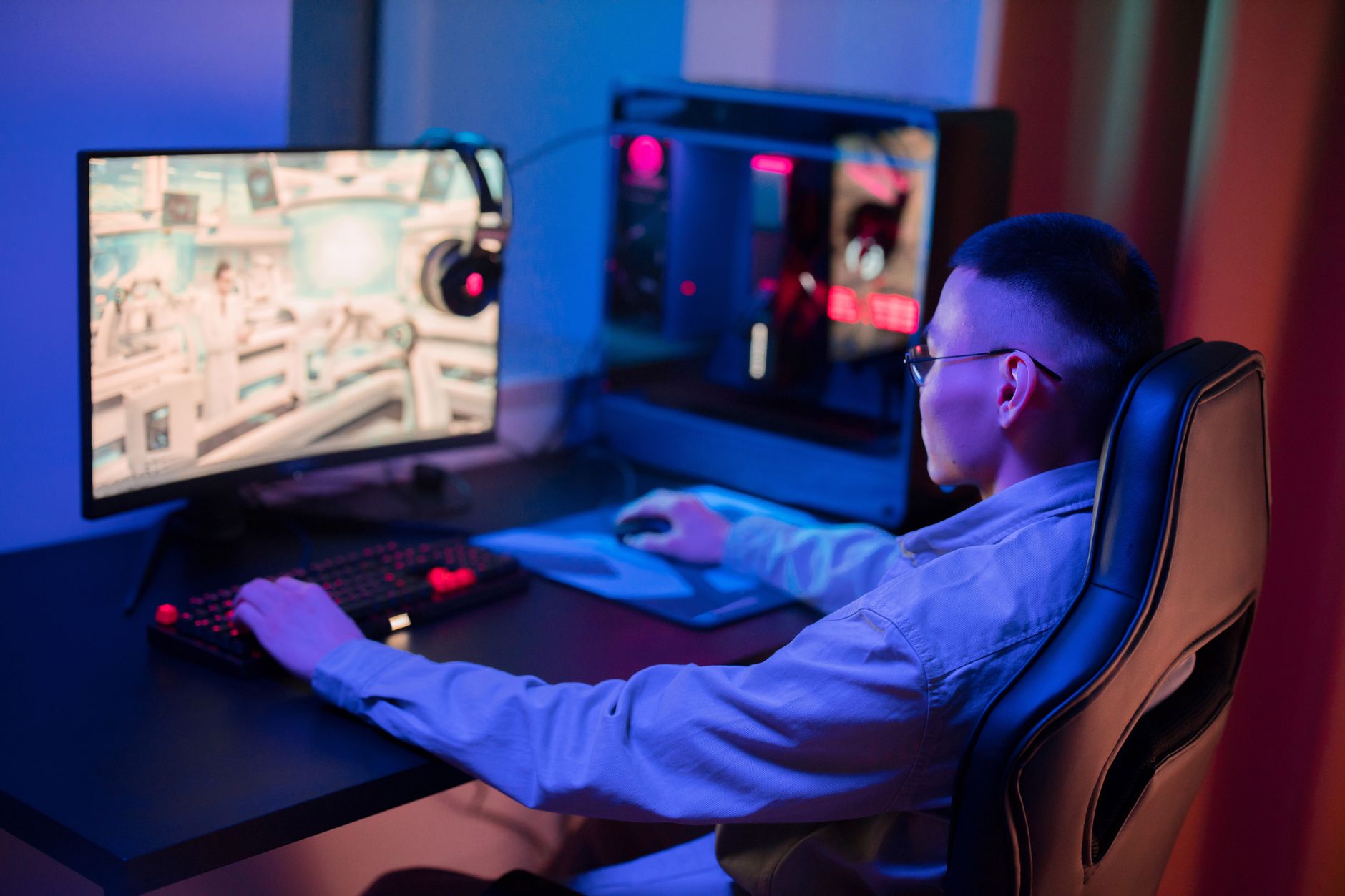 Gaming monitor on a desk displaying high-resolution graphics output