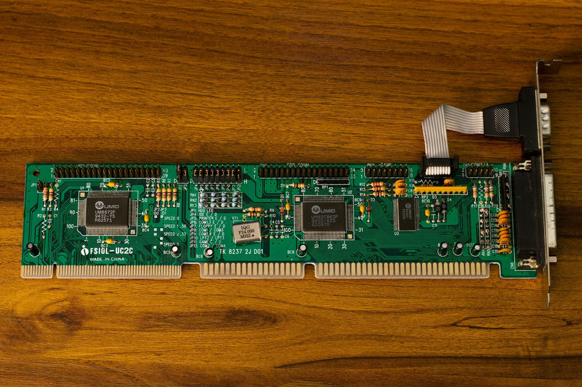 Close-up of PC hardware components including graphics card and motherboard