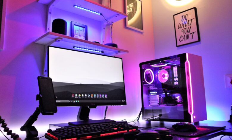 High-end gaming desktop PC setup with RGB lighting representing flagship CPU comparison
