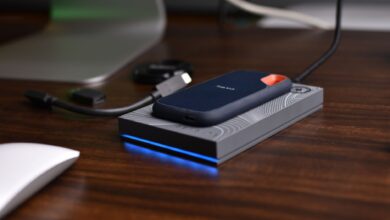 NVMe SSD drives side by side on a dark surface for comparison